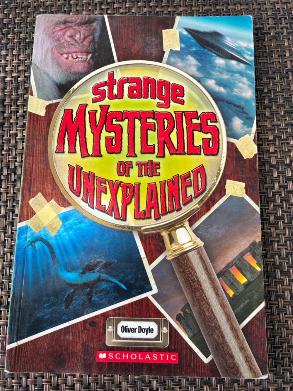 Scholastic Strange Mysteries of the Unexplained — Red and Yellow Cover